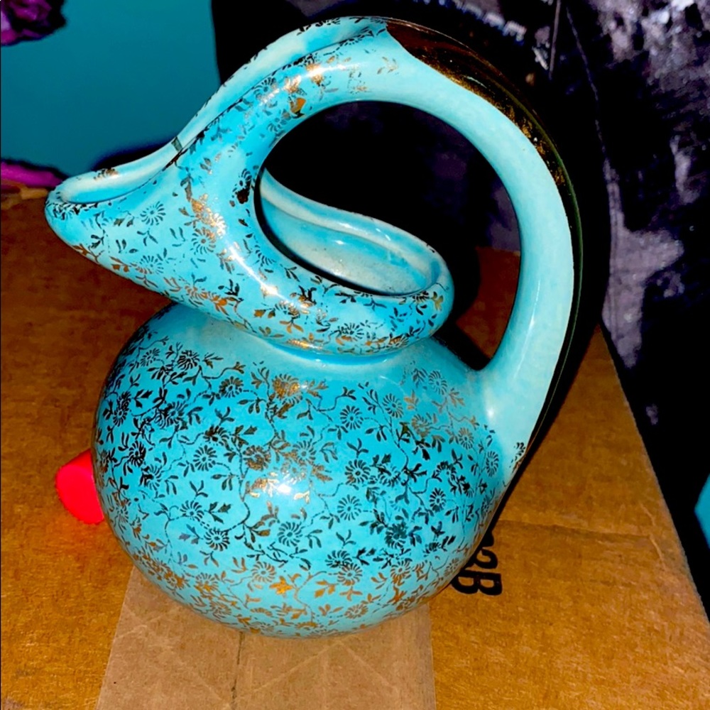 Vintage antique pouring mug